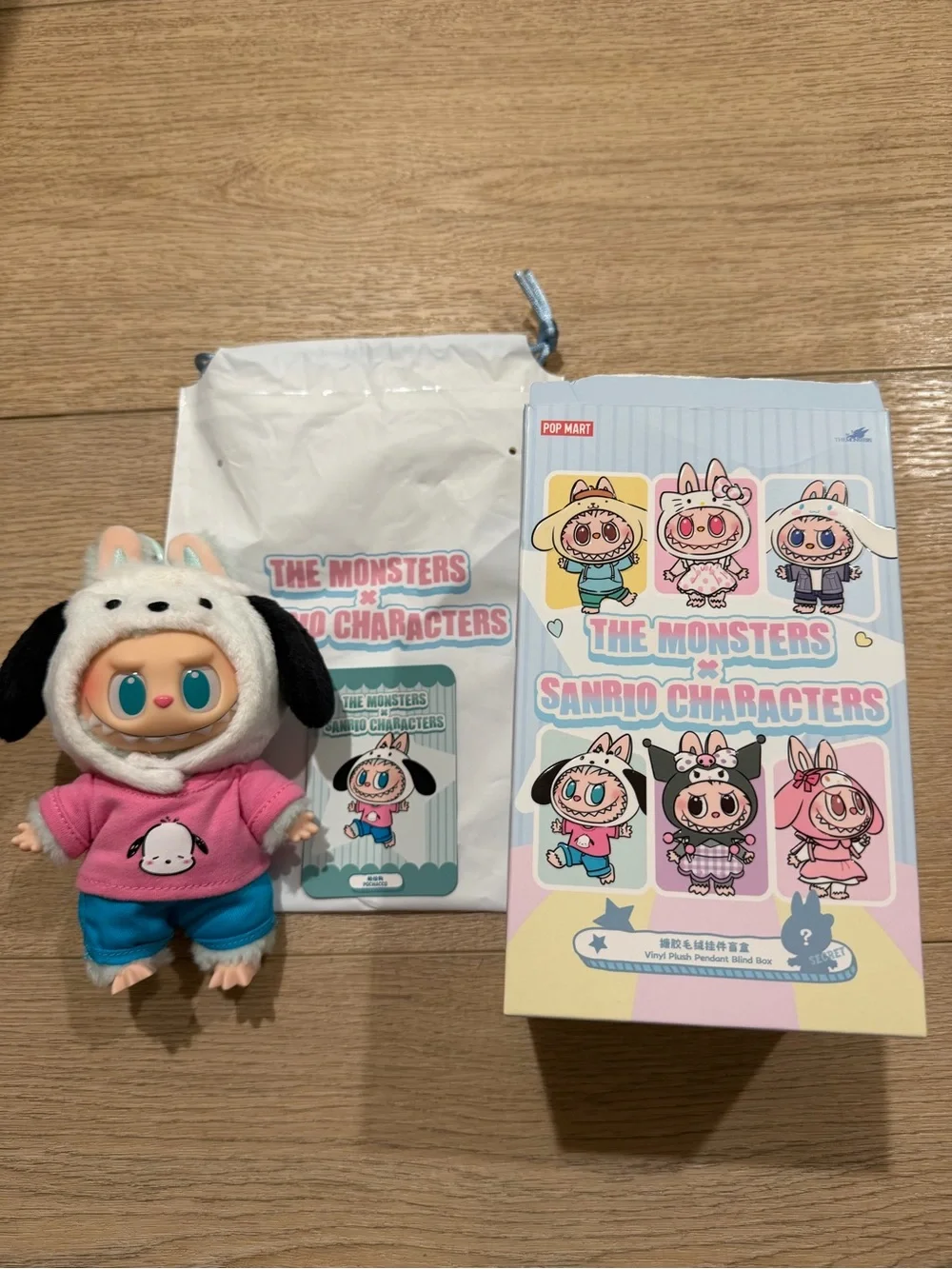 The Monsters x Sanrio Characters pochacco Labubu